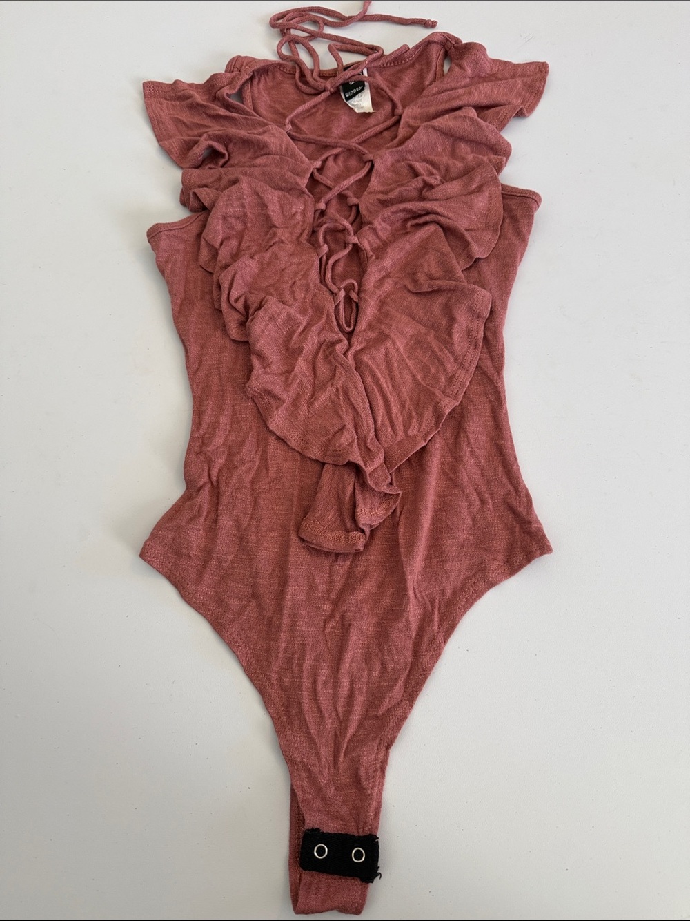 Windsor Ruffle Front Lace Up One-Piece Bodysuit in Mauve Pink